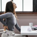 Quais os sintomas de coluna lombar inflamada? Descubra como identificar e tratar esse problema